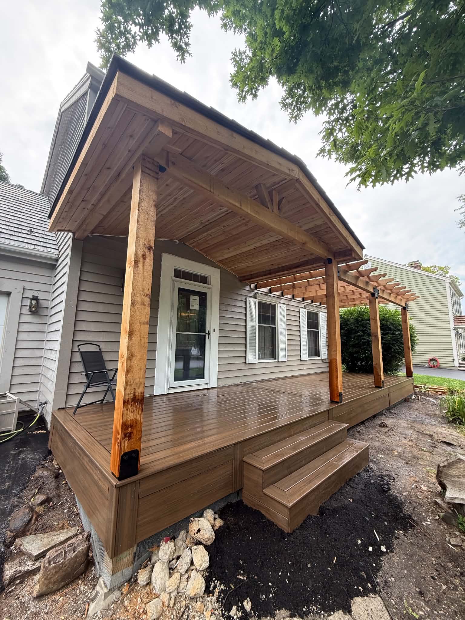 Composite deck with cedar gable roof